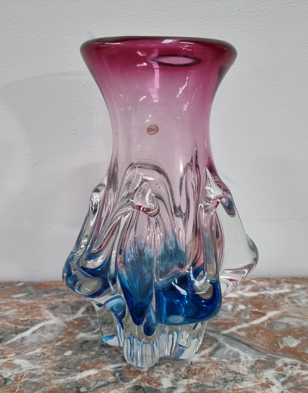 Vintage “Murano” hand made blue and cranberry glass vase. In excellent condition.
