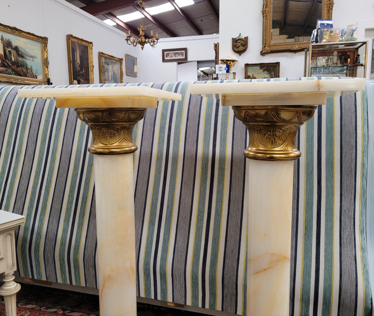 Pair of Imposing French alabaster marble and bronze pedestals. They are highly decorative and have been sourced from France. They are in good original detailed condition.