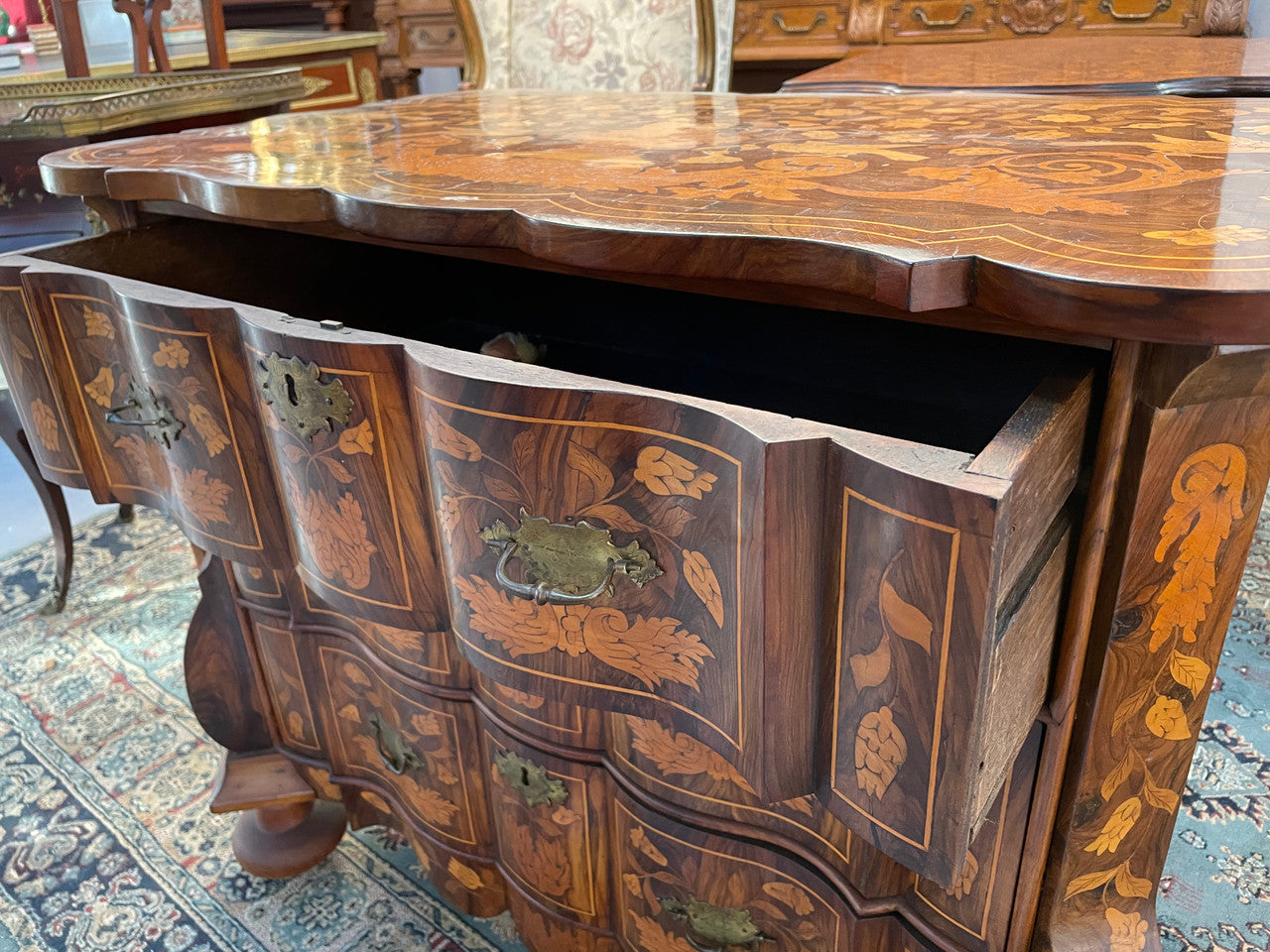 Very Fine highly decorative 18th century Dutch 3 drawer commode. It retains its original brass hardware and Escutcheons. In very good original detailed condition.