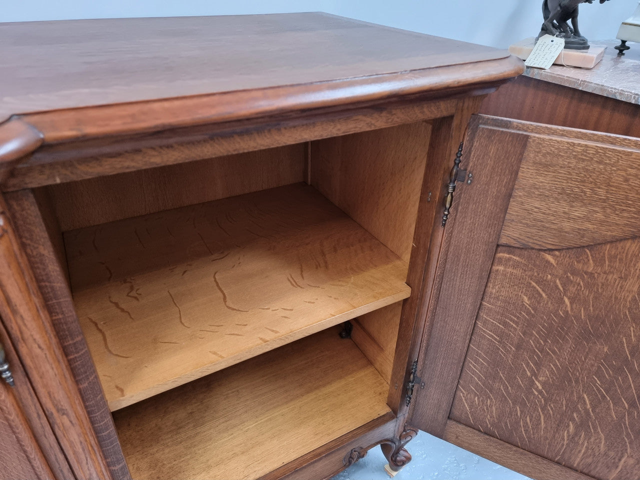 French oak large, beautifully carved four door sideboard with lockable doors and plenty of room for storage in good original condition.