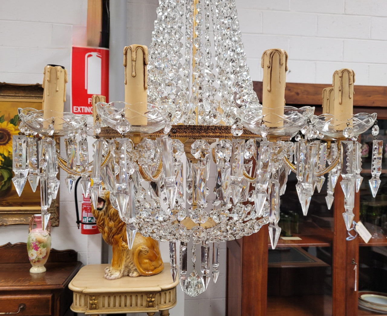 Fine French Empire basket shaped crystal chandelier. Consisting of ten exterior arms and four interior lights. It has stunning crystal's with prism drops. It has been sourced from France fully rewired to Australian standards.
