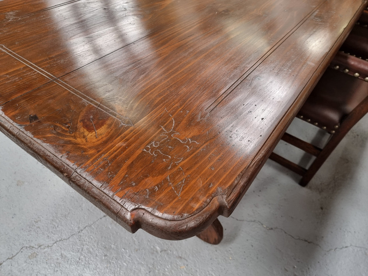 Amazing hard to find French Fruitwood Spanish style 3 meter dining table. Decorative iron work underneath and in good detailed original condition.