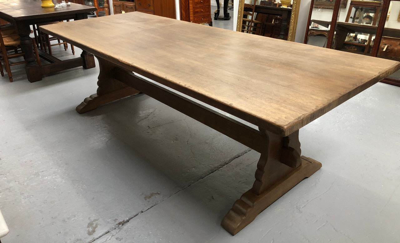 Lovely long French light oak Farmhouse table with a good thick plank top and beautiful stretcher base. Can seat 12 people very comfortable and is in good original condition.