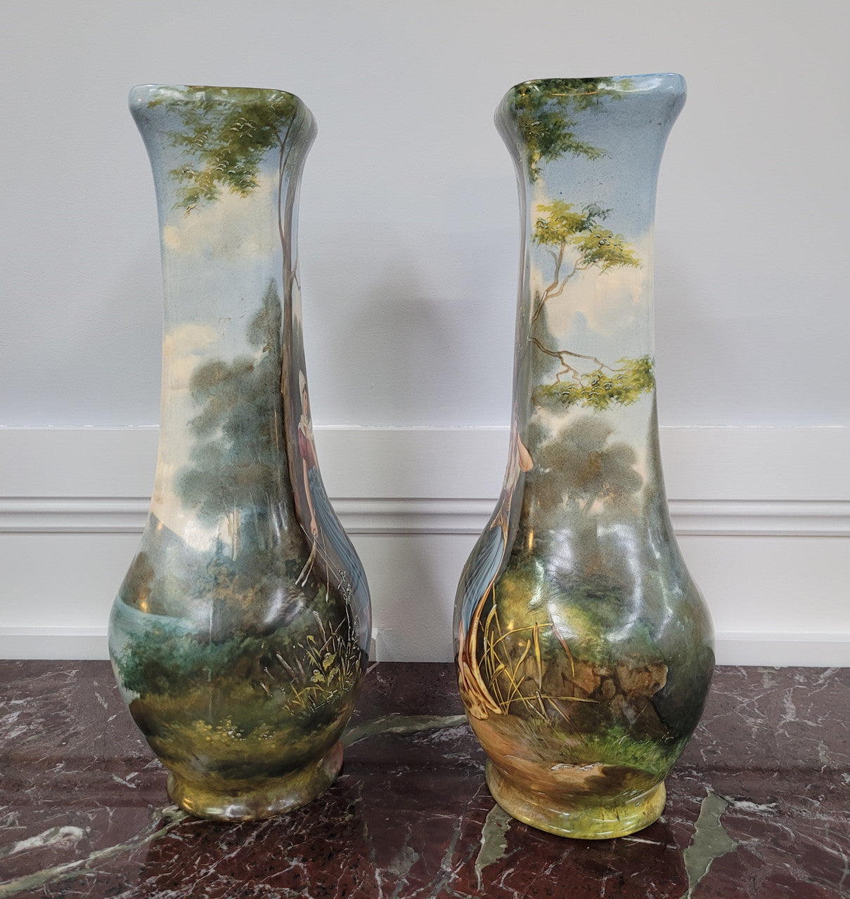 Pair of Victorian hand painted decorative vases depicting women. Please view photos as they help form part of the description.