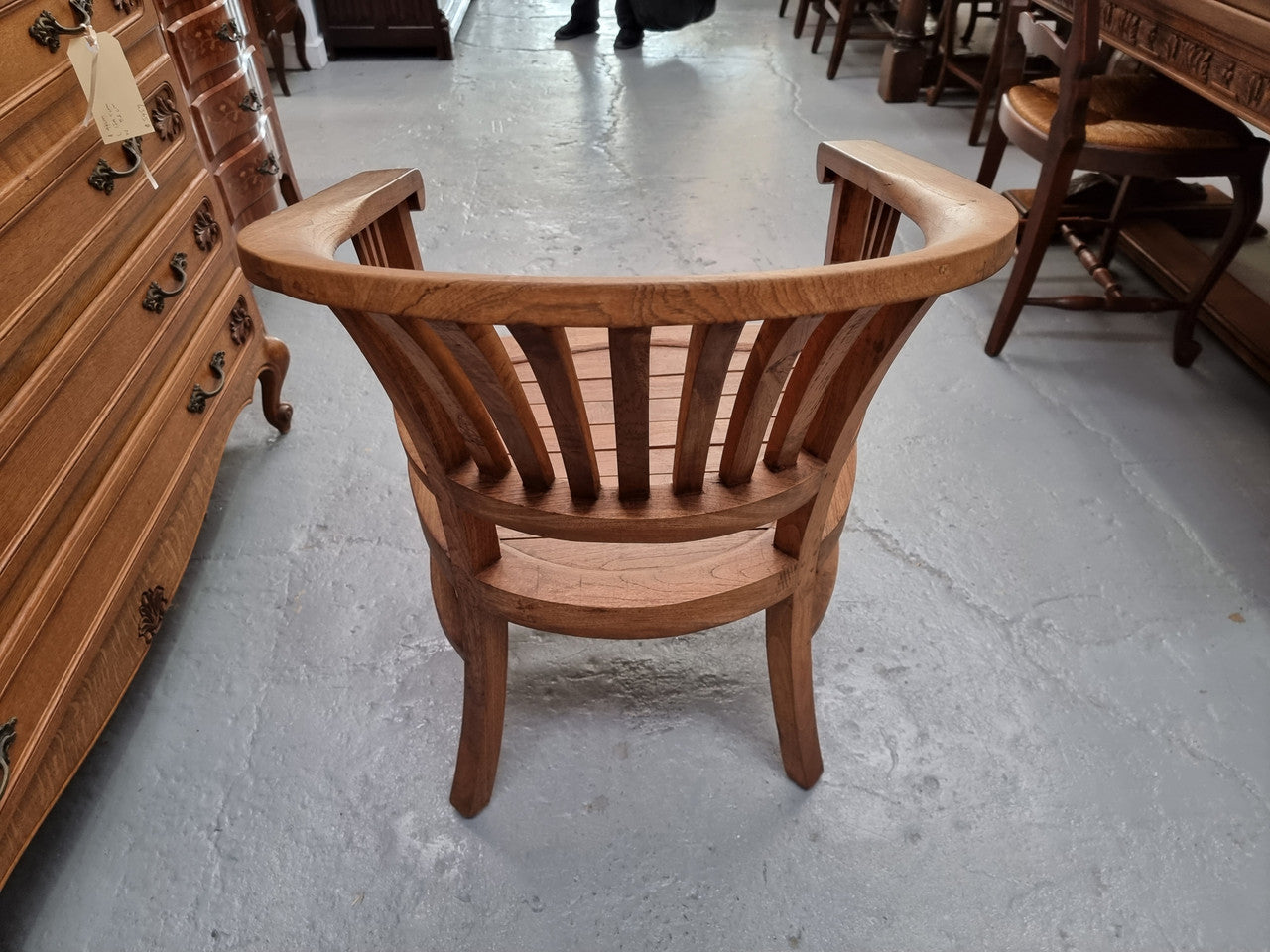 Vintage teak "Captains Chair". It is well built and very comfortable to sit in. It is in good original detailed condition.