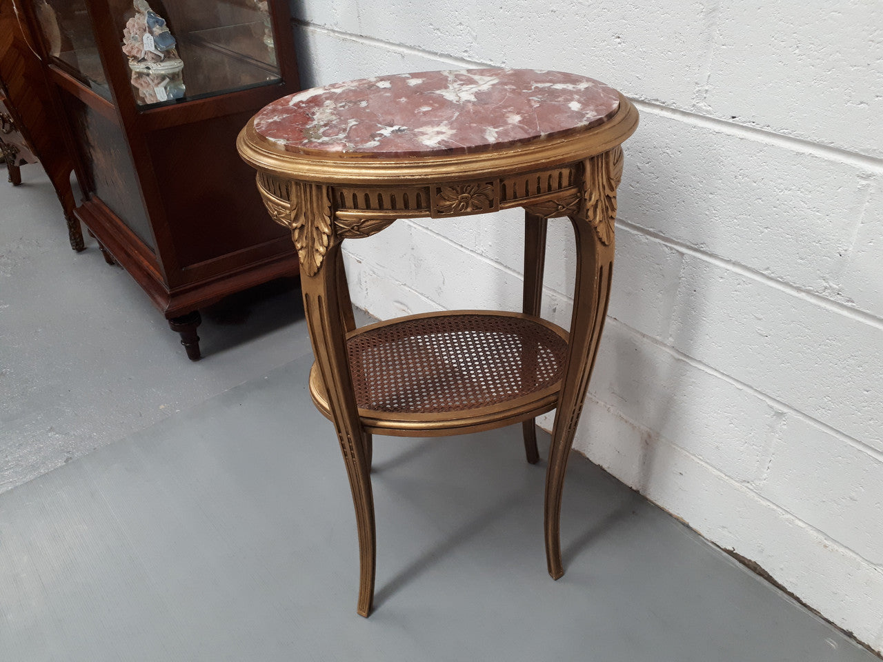 An exceptional & rare 18th century Louis XVI oval inset marble top & giltwood side table with original water gilding. In good restored condition. Circa 1790.