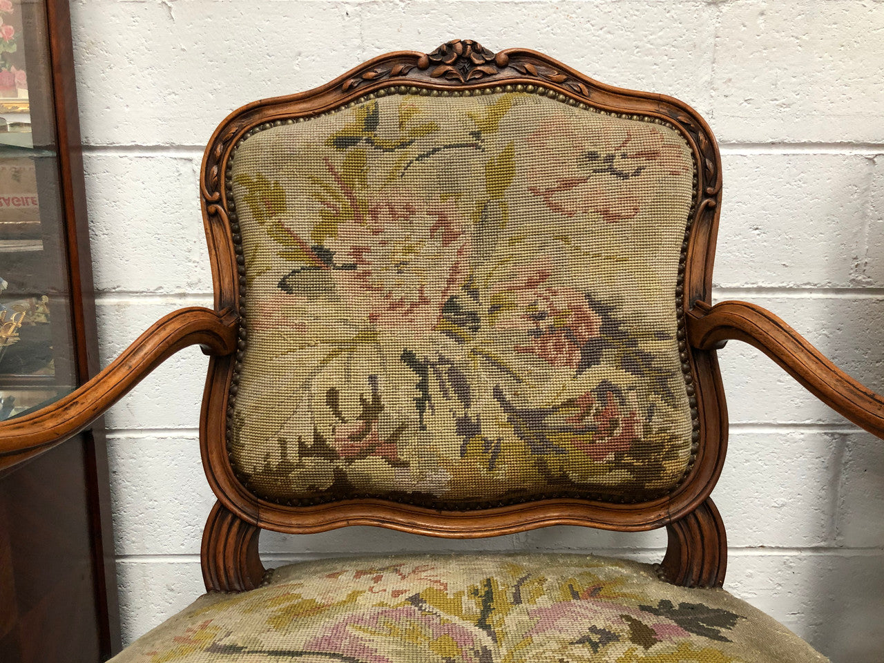 Pair of French Walnut Tapestry covered armchairs. They are in good original detailed condition. Slight wear and tear to fabric but still in good condition please view photos.