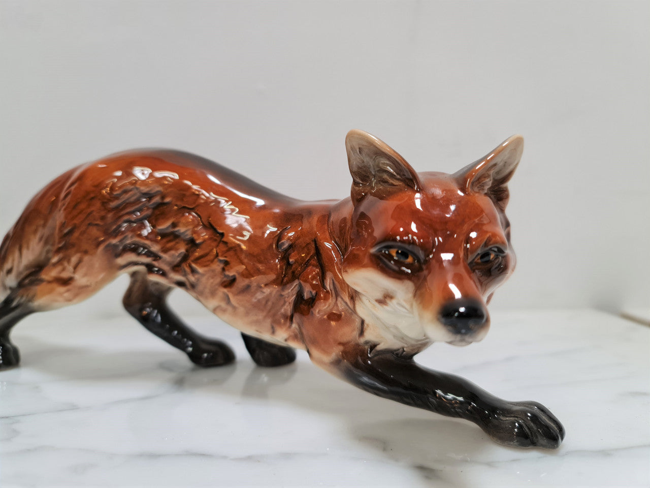 Beautifully sculptured and colored vintage Goebel Hummel fox figurine. Marked to base Goebel W Germany and numbered on leg 014. In great original condition.