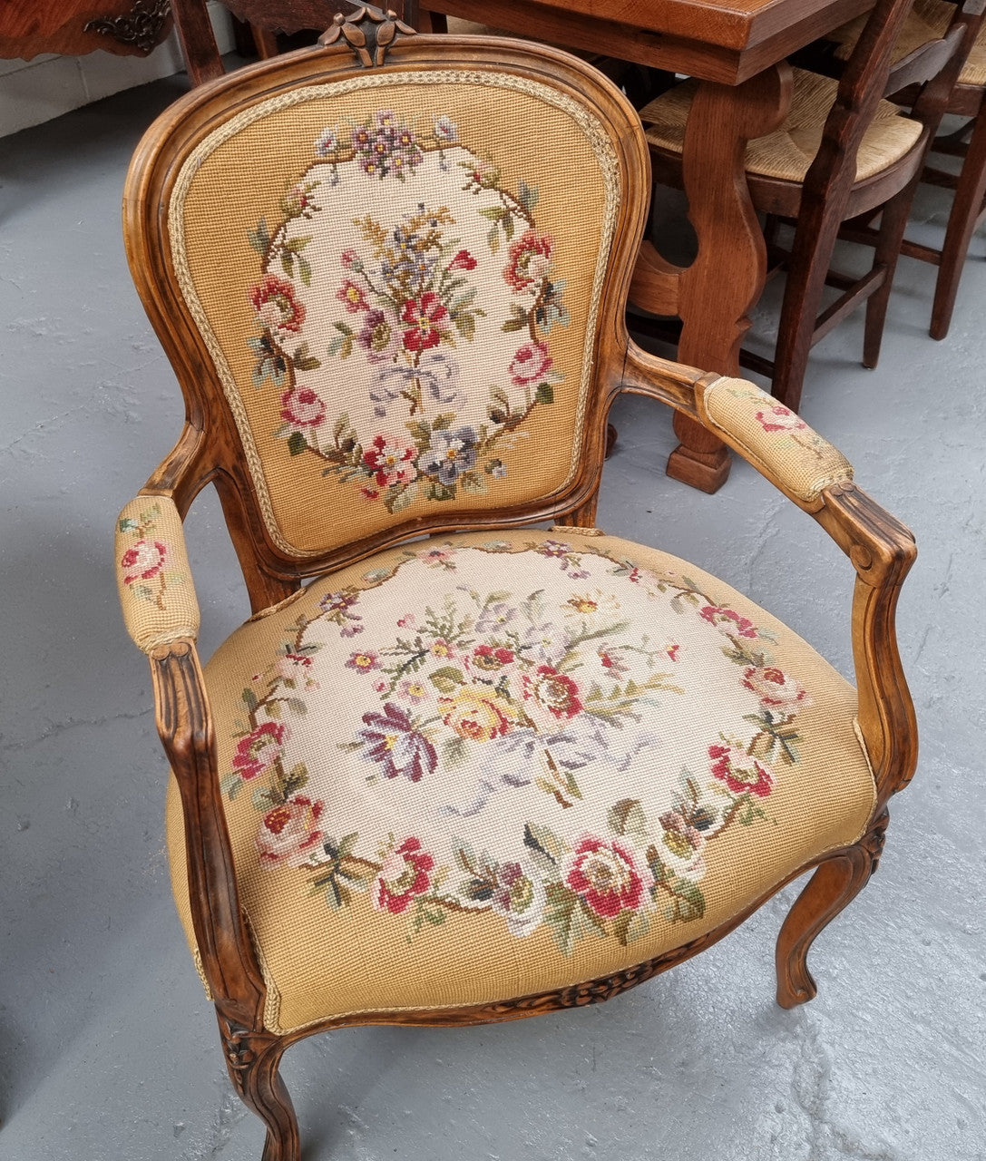 Louis XV style Walnut and tapestry armchair. Very comfortable to sit in and tapestry is in good original used condition.