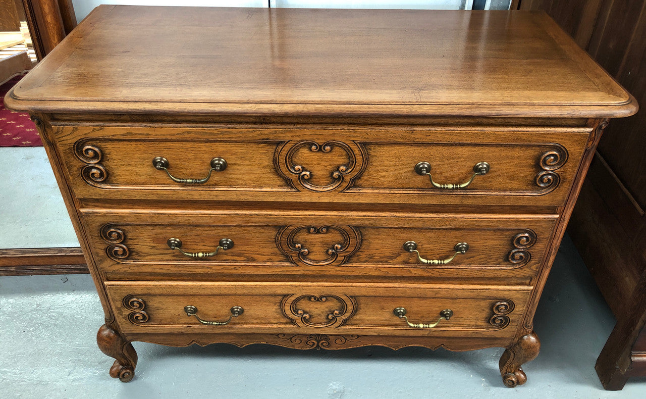 French nicely carved Oak chest of three drawers. In good original detailed condition.