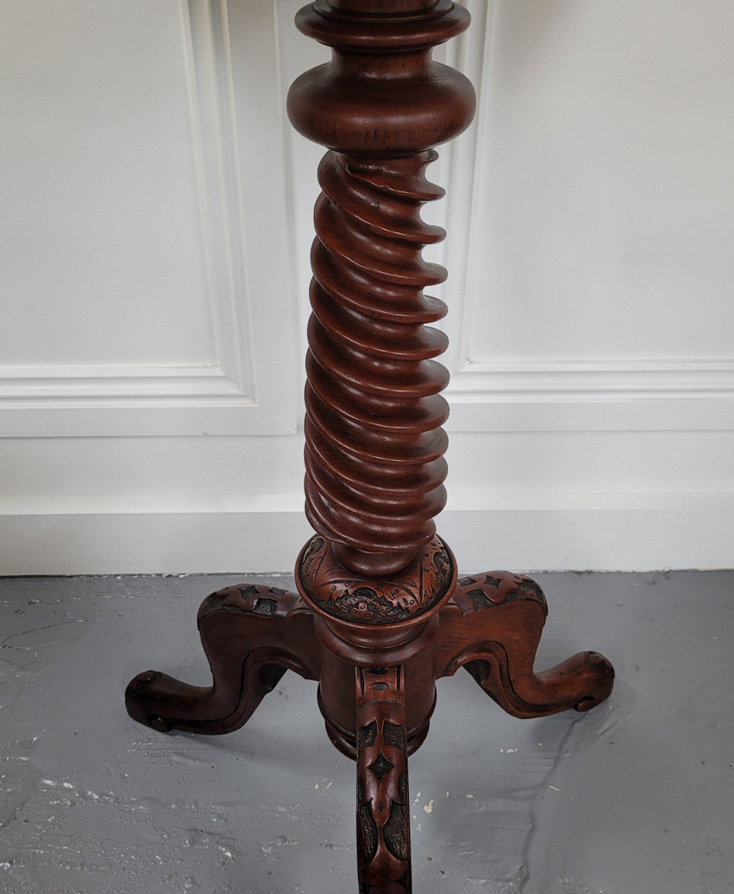 Rare early Victorian Irish Burr Walnut wine table. It has a beautiful carvings and a stunning burr walnut top, on a barley twist column and three shaped legs. It has been sourced locally and is in good original detailed condition. We also have a second table being sold separately which when together make a matched pair.