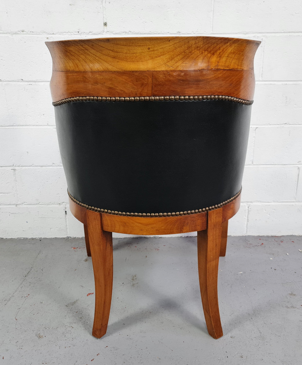 Antique Empire style Walnut and leather office desk chair. In good original detailed condition and leather is in good used condition.