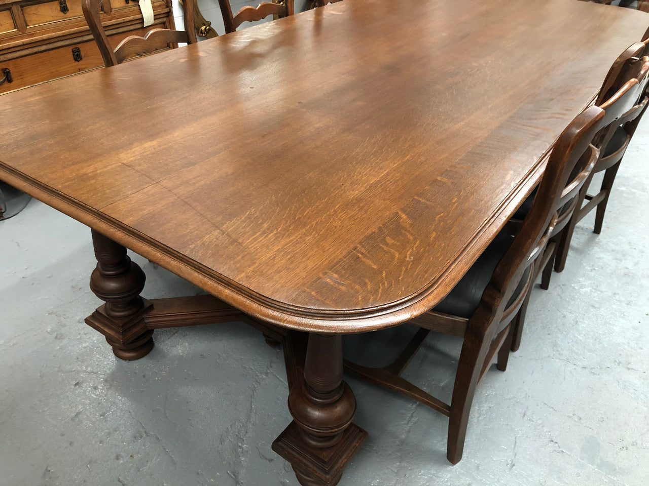 Large French Oak 19th century Henry II style dining table. It can seat 8 very comfortable and being very wide at 119 cm there is plenty of space to sit 10. In good original detailed condition.