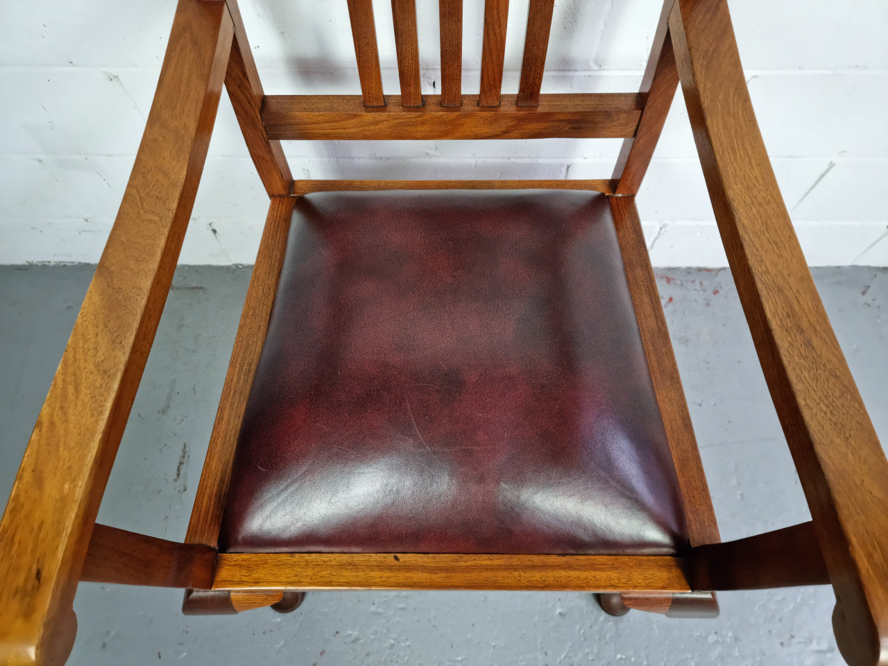 A very comfortable Black Wood Period leather seat armchair. In leather and chair are in good original condition.