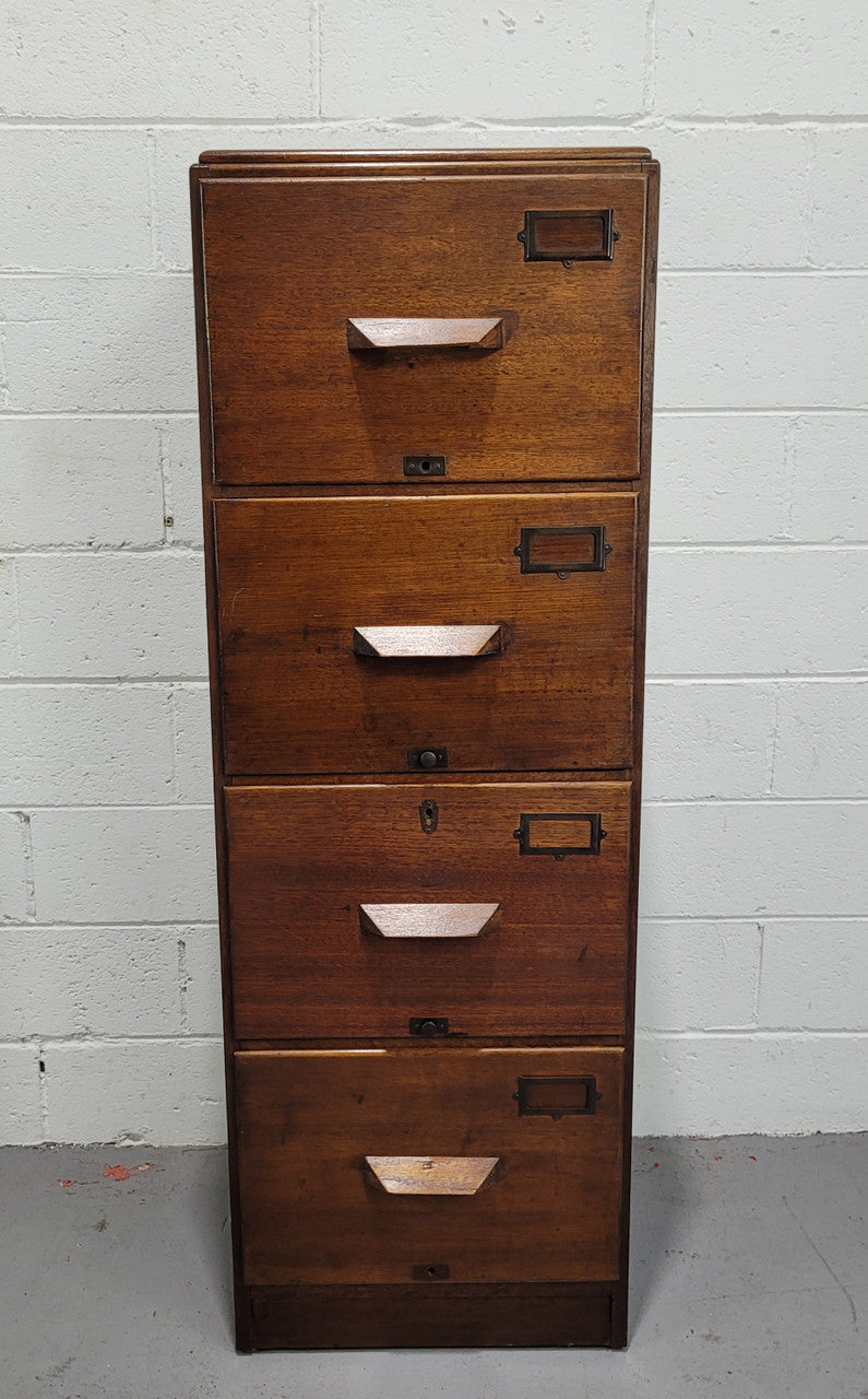 Blackwood four drawer filing cabinet in good original detailed condition.