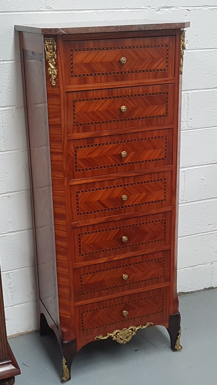 French Kingwood & Rosewood inlaid semainier with a beautiful and practical marble top. Sourced directly from France and is in very good original condition.