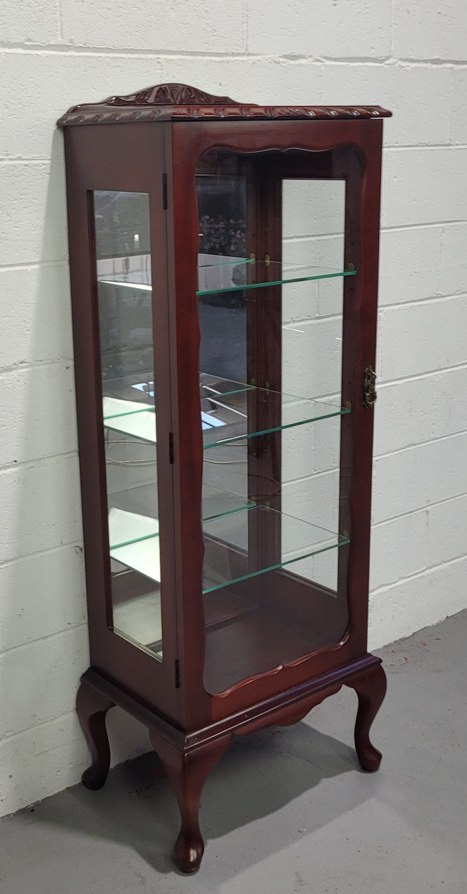 Vintage Mahogany petite display cabinet with three solid glass shelves. Ideal for a small area and is in good original detailed condition.
