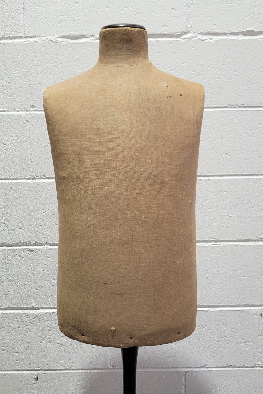 Vintage fabric covered child mannequin on adjustable wooden base. In good original condition.