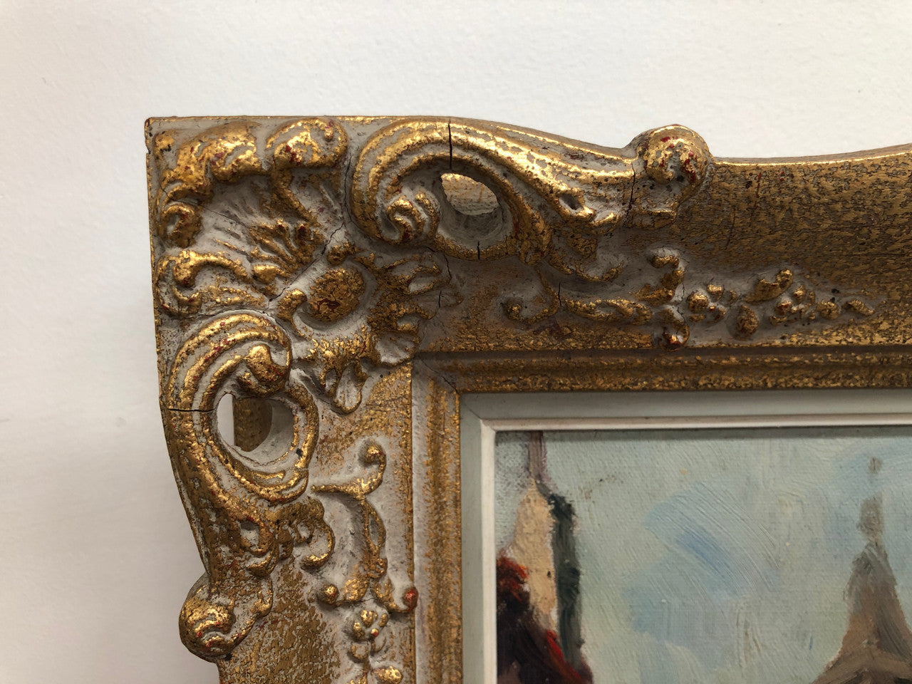 Pair of Vintage framed French oil on canvas of "Village Scenes". They are both in good original detailed condition.