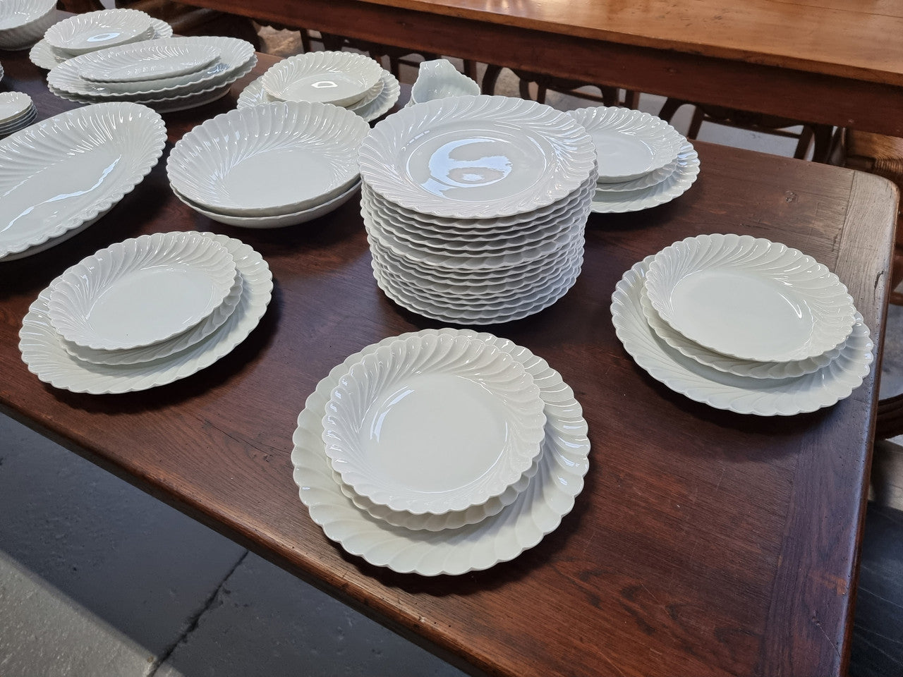 Limoge "Haviland" large white part dinner service. Includes some white service with gilt decoration. Although most items are in good condition please note two plates do have small chips. We are able to supply more photos on request.