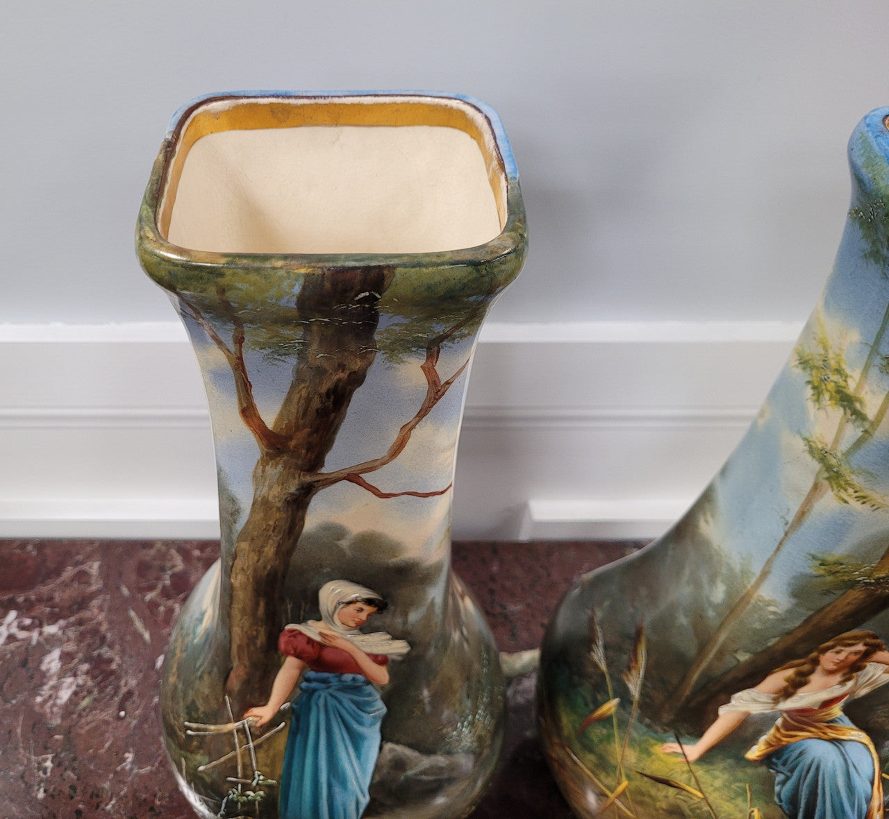 Pair of Victorian hand painted decorative vases depicting women. Please view photos as they help form part of the description.