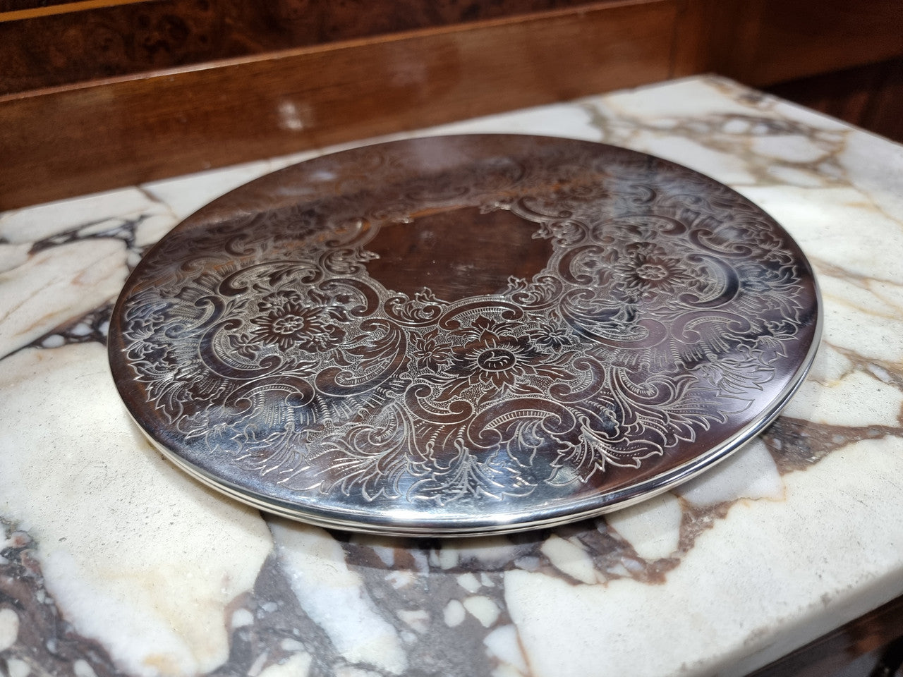 Two Strachan 30cm Silver Plate center table coasters. In good original condition.