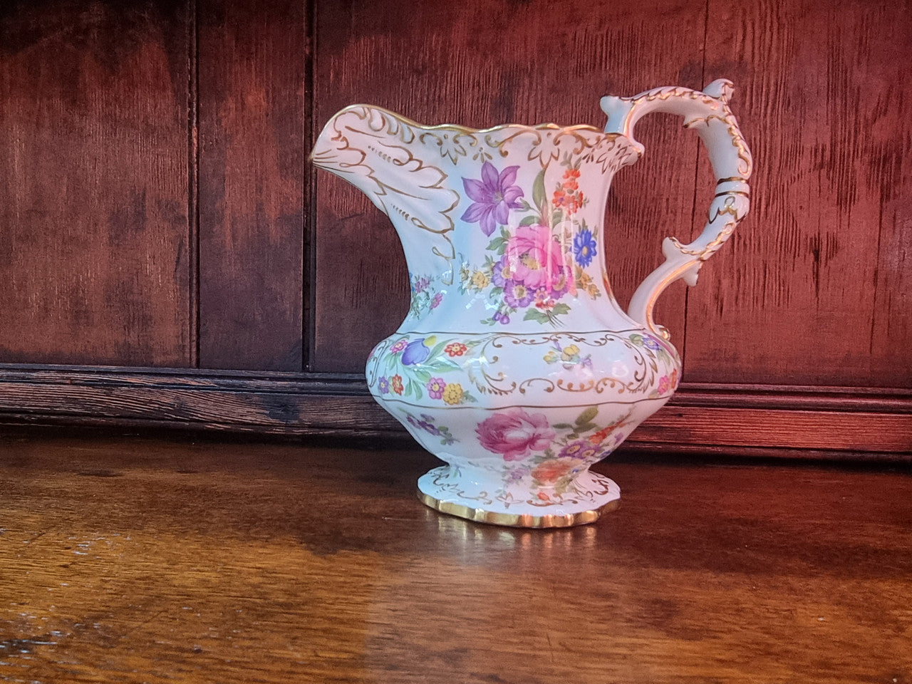 Hammersley England “Dresden Sprays” footed jug. Beautifully sculptured and decorated with gold detail.