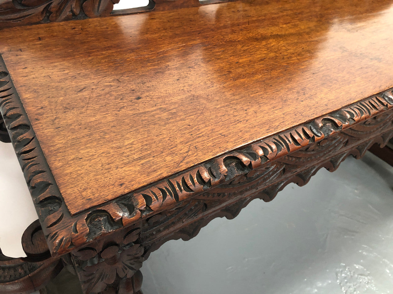 Superb 19th Century Gothic style hall/console table. It has umbrella and walking stick holders on both sides. In good original detailed condition.
