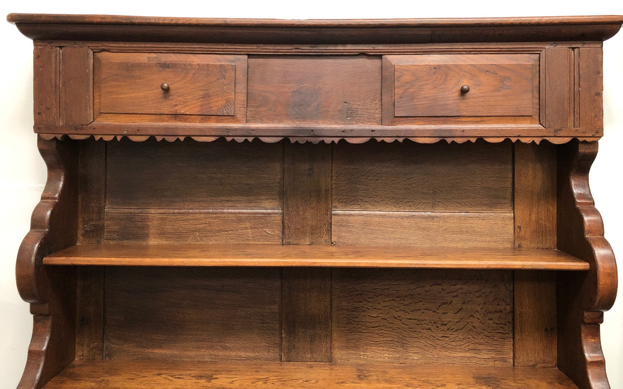Fabulous early 19th century French Oak open shelf bookcase, with four shelves and hidden shelf at the top with two sliding doors. In very good original detail condition.