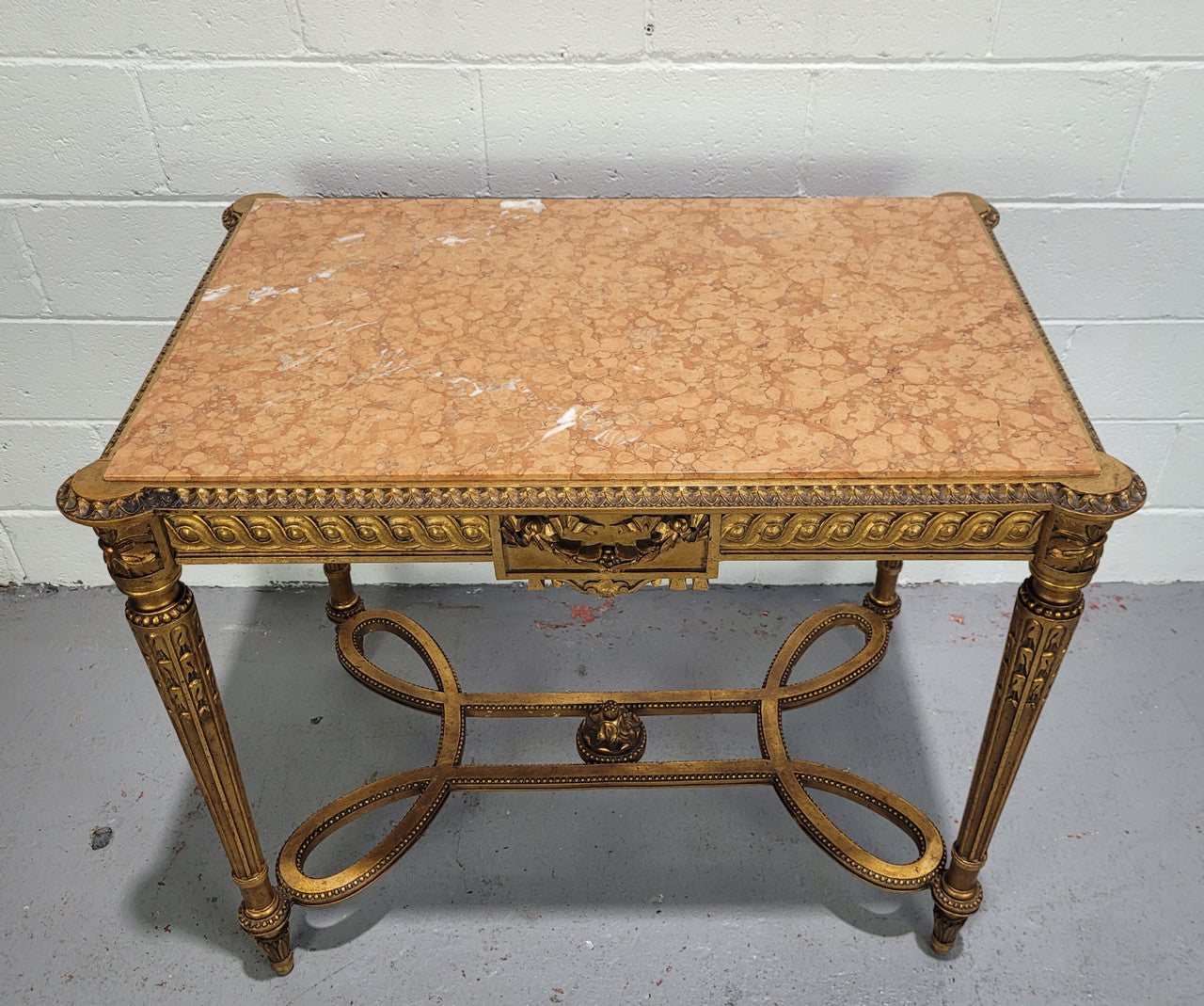 Antique French Louis XVI style gilt center table with a stunning marble top. Featuring stunning ornate carving and it is in great original condition. It has been sourced directly from France.