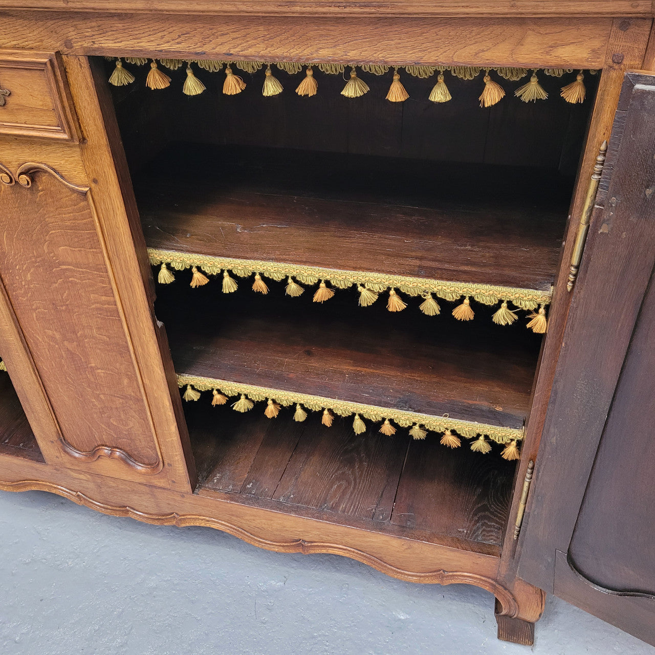 Amazing French Oak early 19th Century two door sideboard with one drawer and two fixed shelves. Sourced from France and in good original detailed condition.
