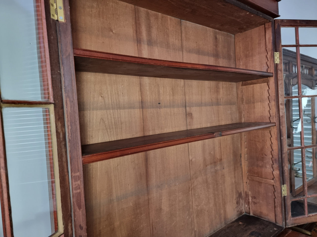 Rare early Australian colonial full Cedar bookcase. Plenty of storage underneath and glass top doors open up too three fully adjustable shelves. In good restored condition.