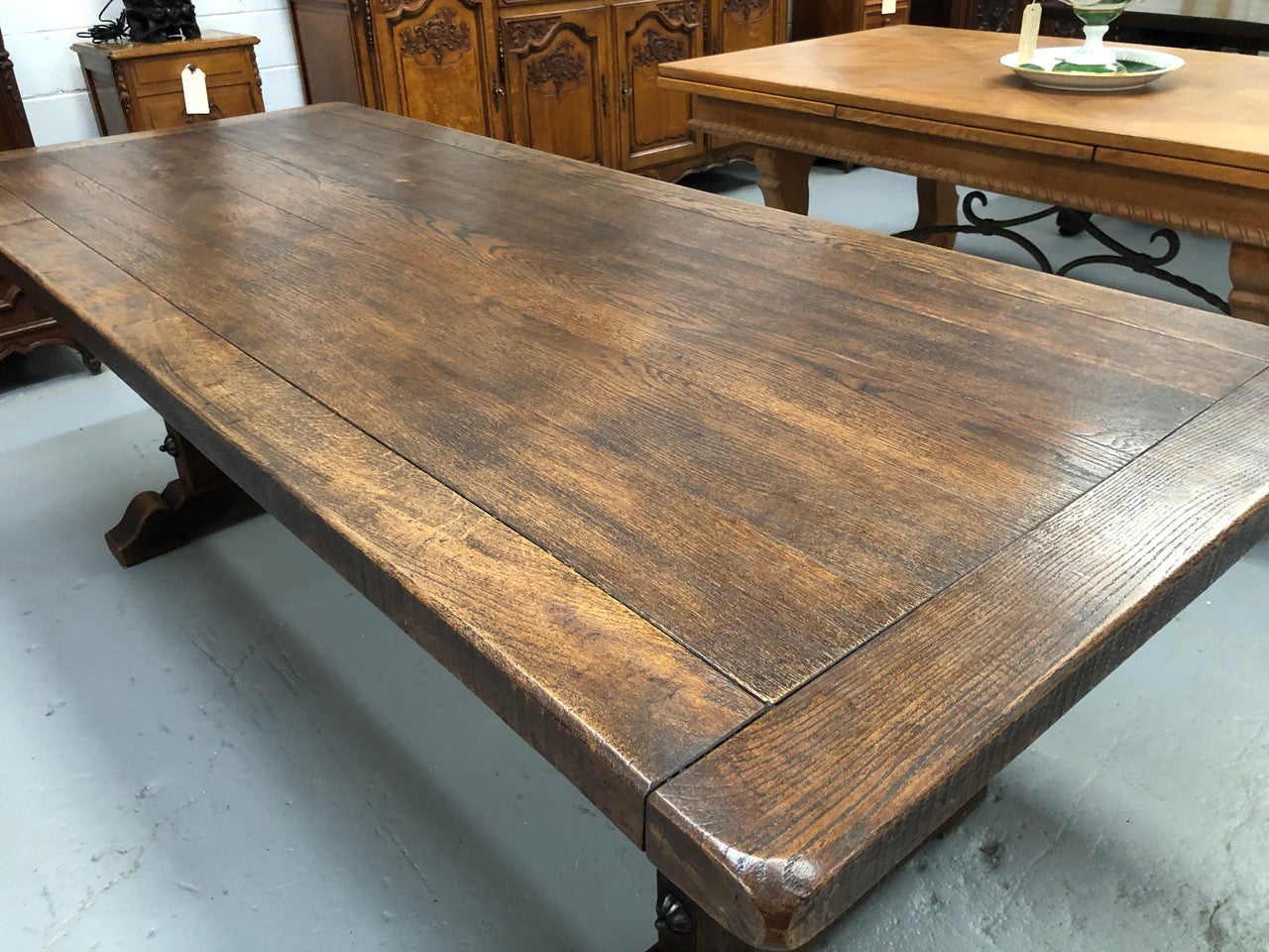 French Oak stretcher base Farmhouse dining table. In good original detailed condition.