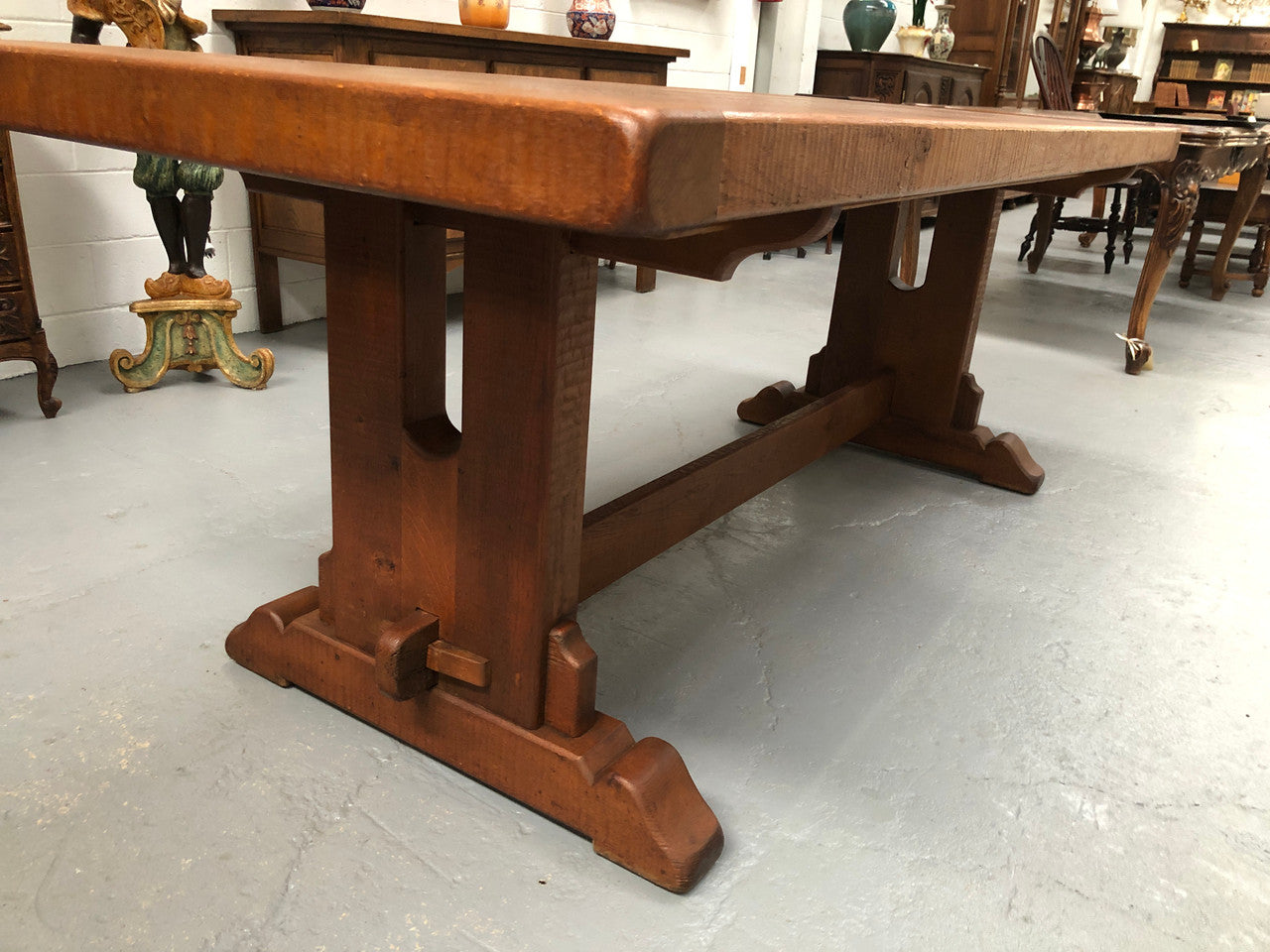 Lovely Oak French Farmhouse table with a thick plank top and lovely stretcher base. Can comfortable seat 8-10 people and is in good original detailed condition.