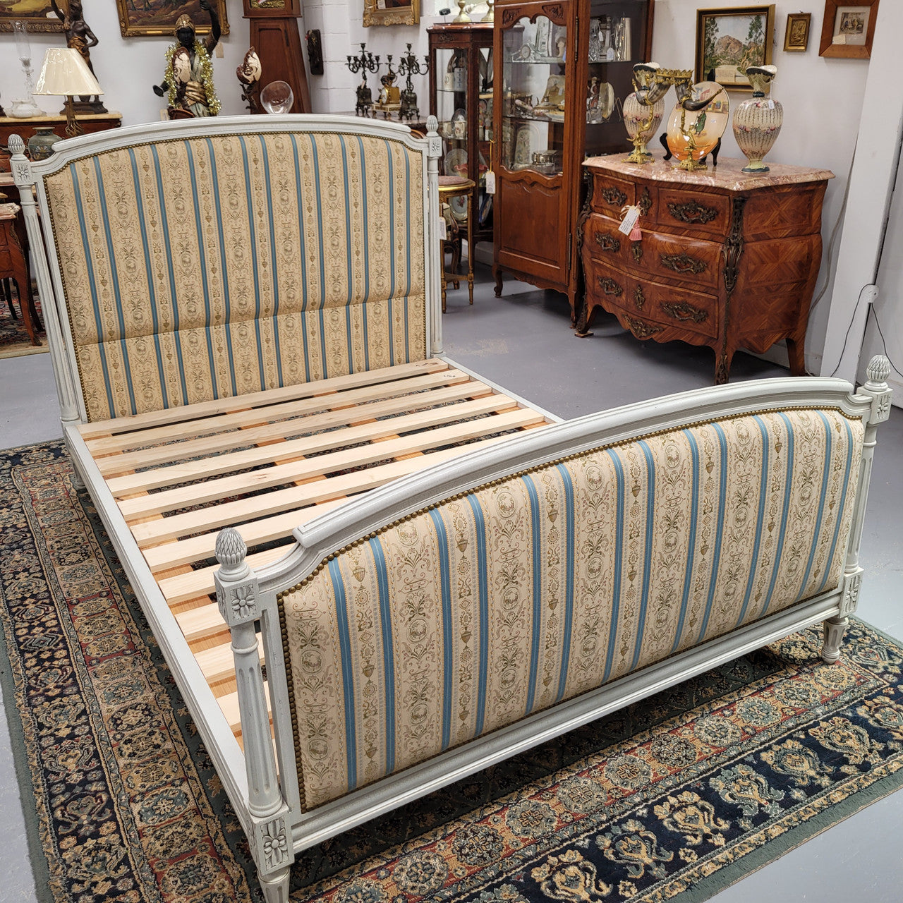 French Louis 16th style double bed and rails with original crackle paint. It also has good quality upholstery. Bed comes complete with custom made slats. Just place your mattress on top. Sourced from France and in good original detailed condition.