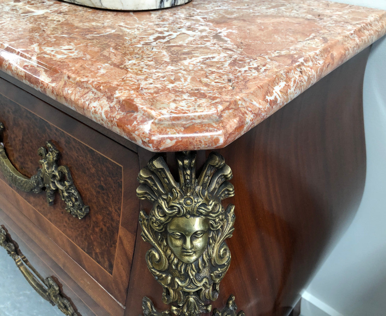 Grande French Louis XIV style Amboyna and walnut two drawer marble top commode, with amazing detailed ormolu mounts, and sienna colour marble top. In good original detailed condition.