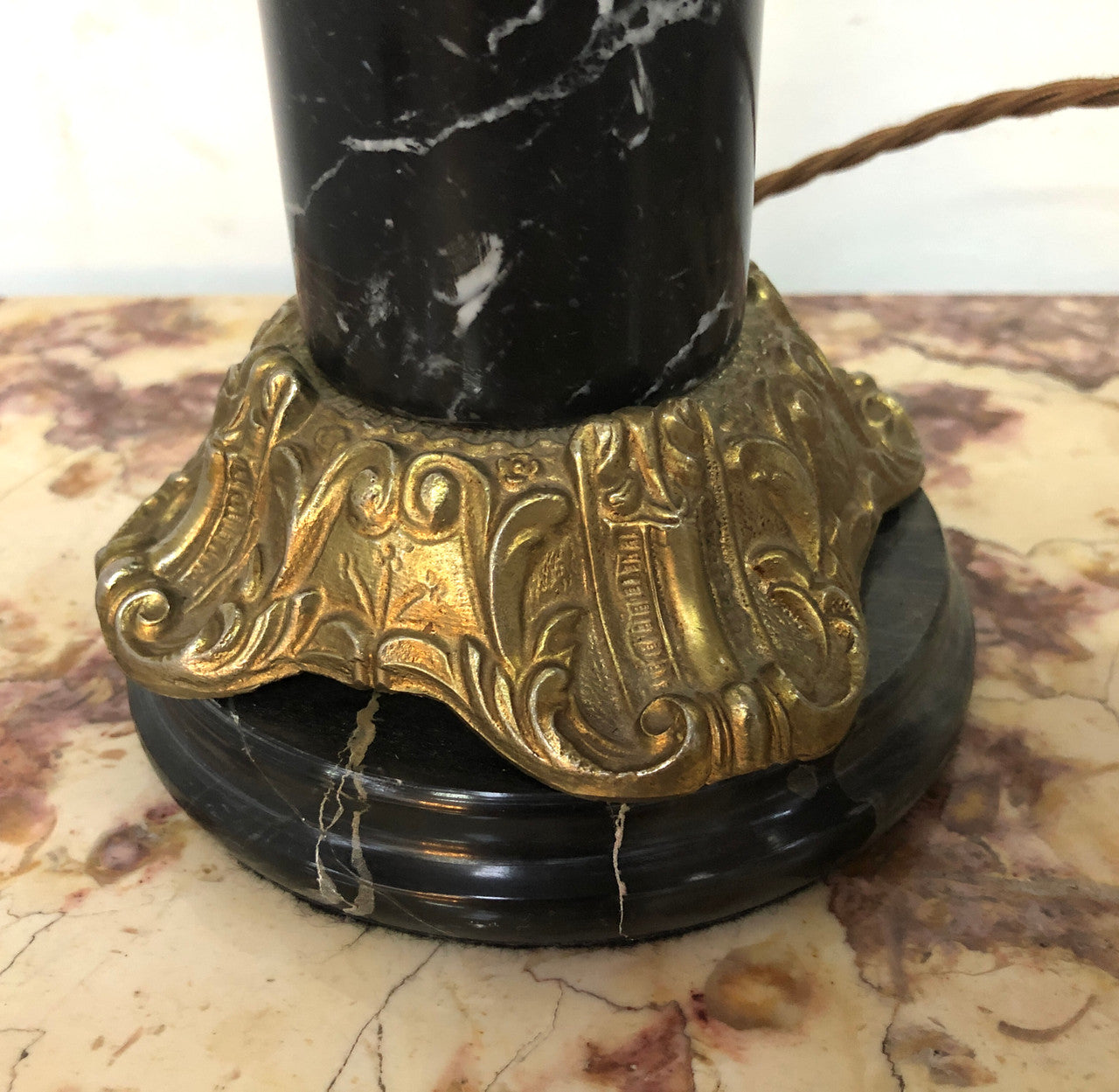 Vintage Brass cherub lamp with a marble and brass base and lovely frosted flame glass shade in good condition.