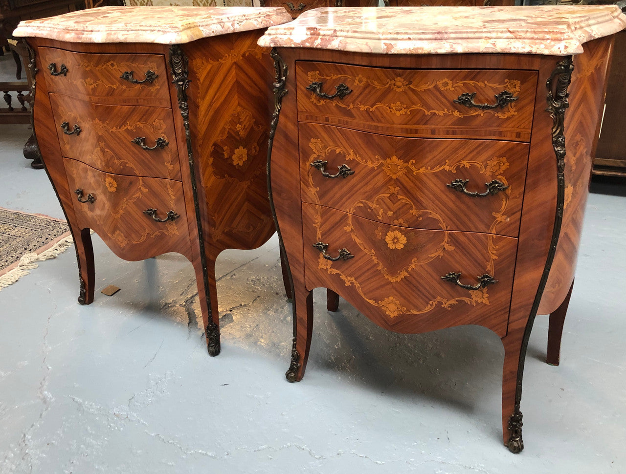 Rare Pair of French miniature commode bedsides with beautiful marquetry inlay & ormolu mount. Circa 1950's and are in very good condition.