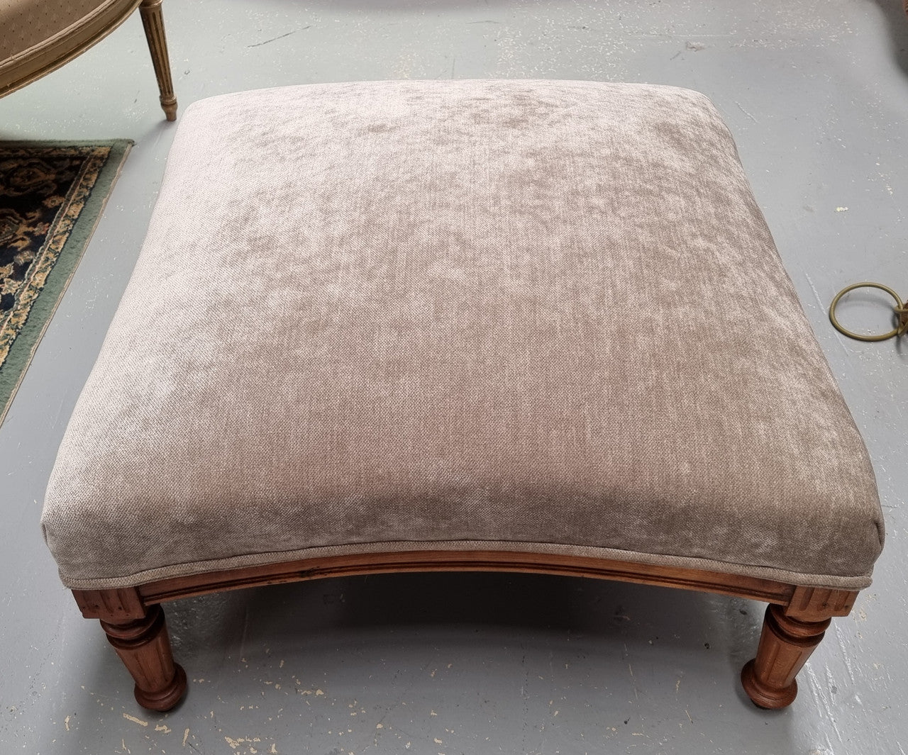Lovely French Louis 16th style large walnut footstool with light grey upholstery. Circa:1900. In good detailed condition.