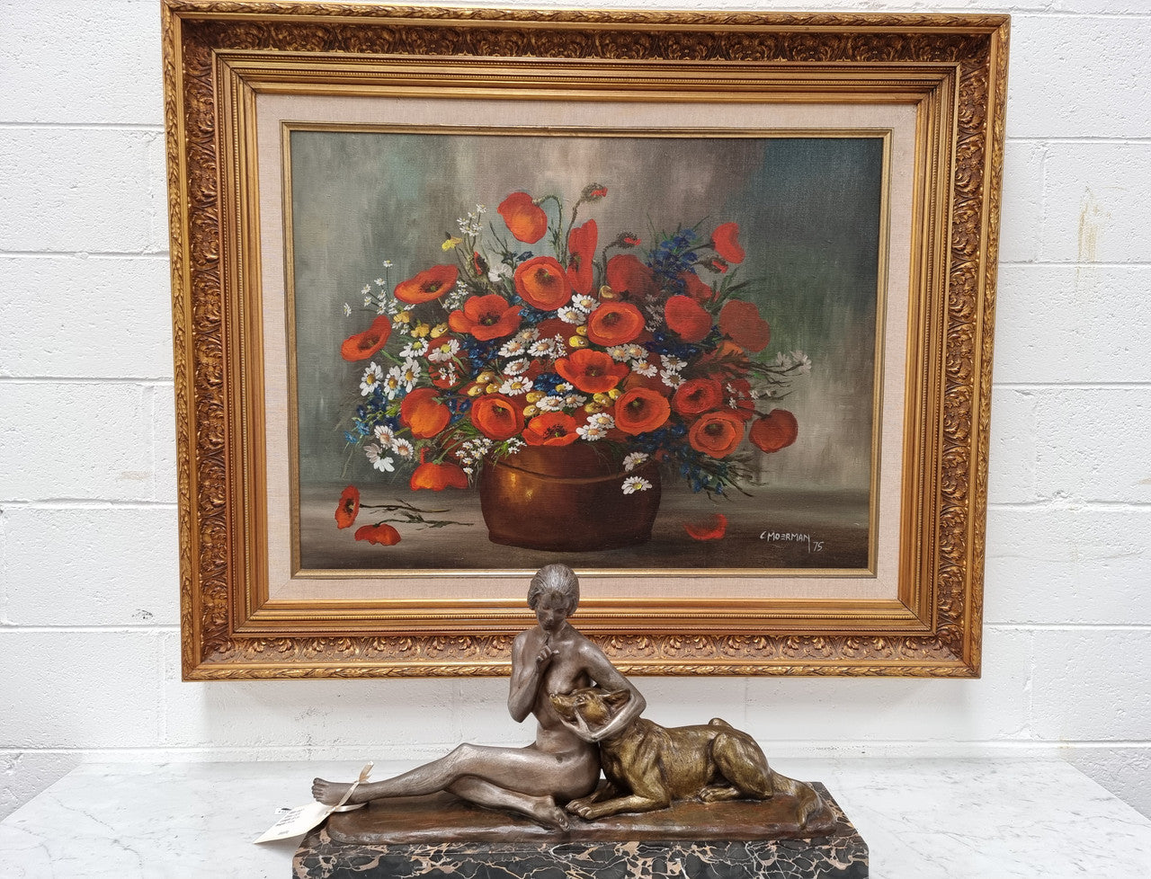 Lovely Vintage signed floral oil on canvas of Poppies and Daisy's and in a decorative gilt frame . In good original detailed condition.
