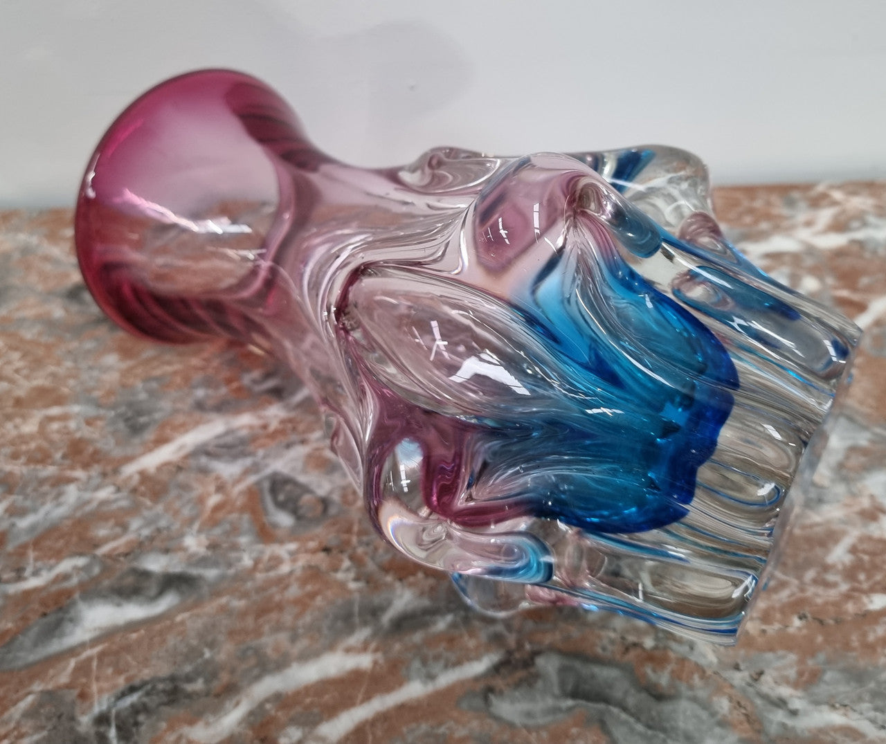 Vintage “Murano” hand made blue and cranberry glass vase. In excellent condition.