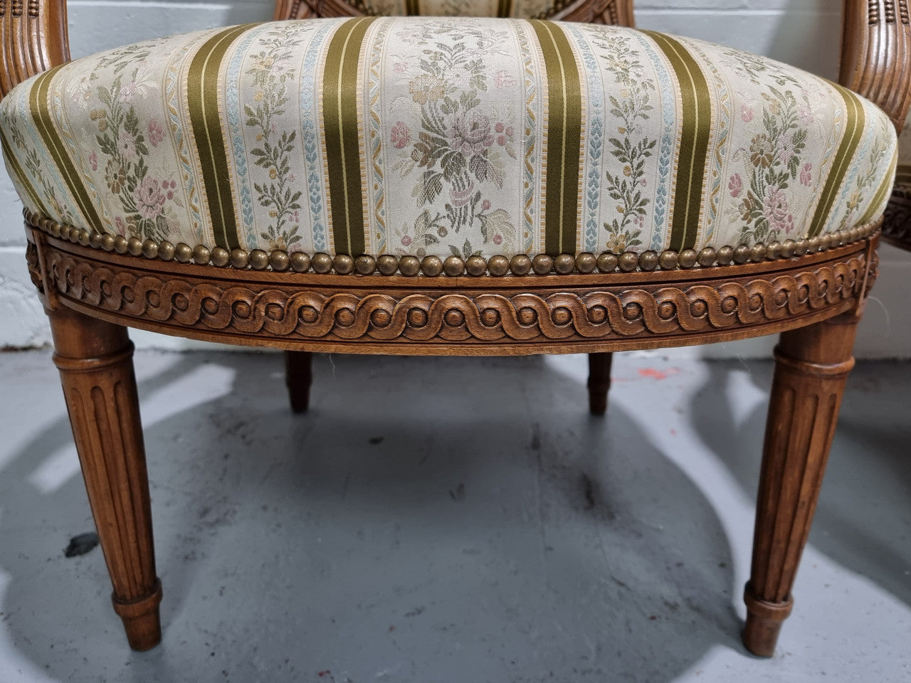 Pair of French Louis XV matching carved armchairs. They are in good overall condition with some slight wear to fabric, please view photos as they help form part of the description.