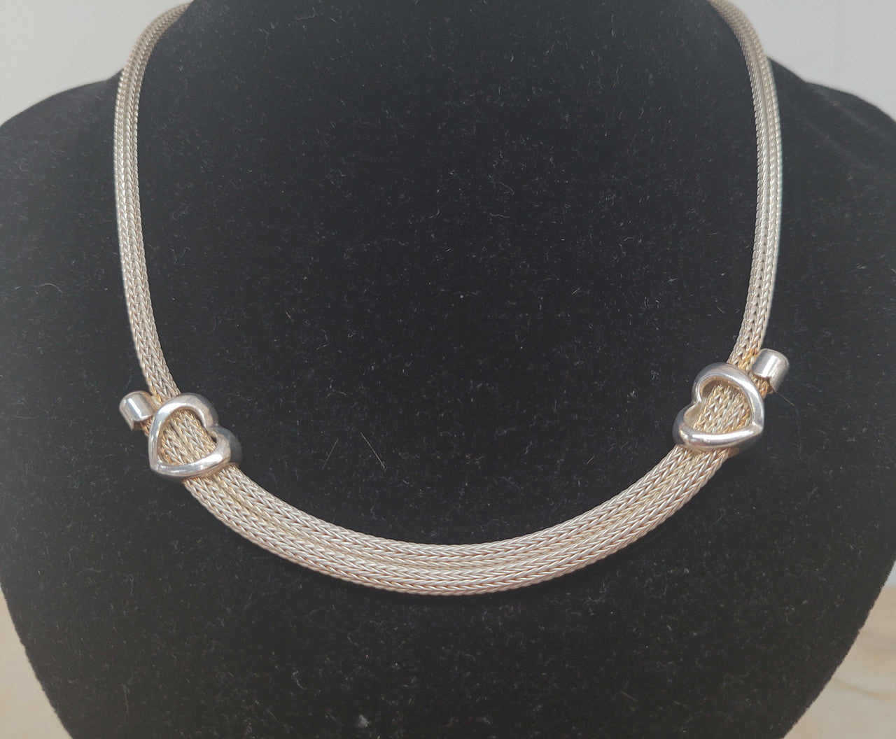 Beautiful Italian sterling silver woven double heart necklace. In good condition.