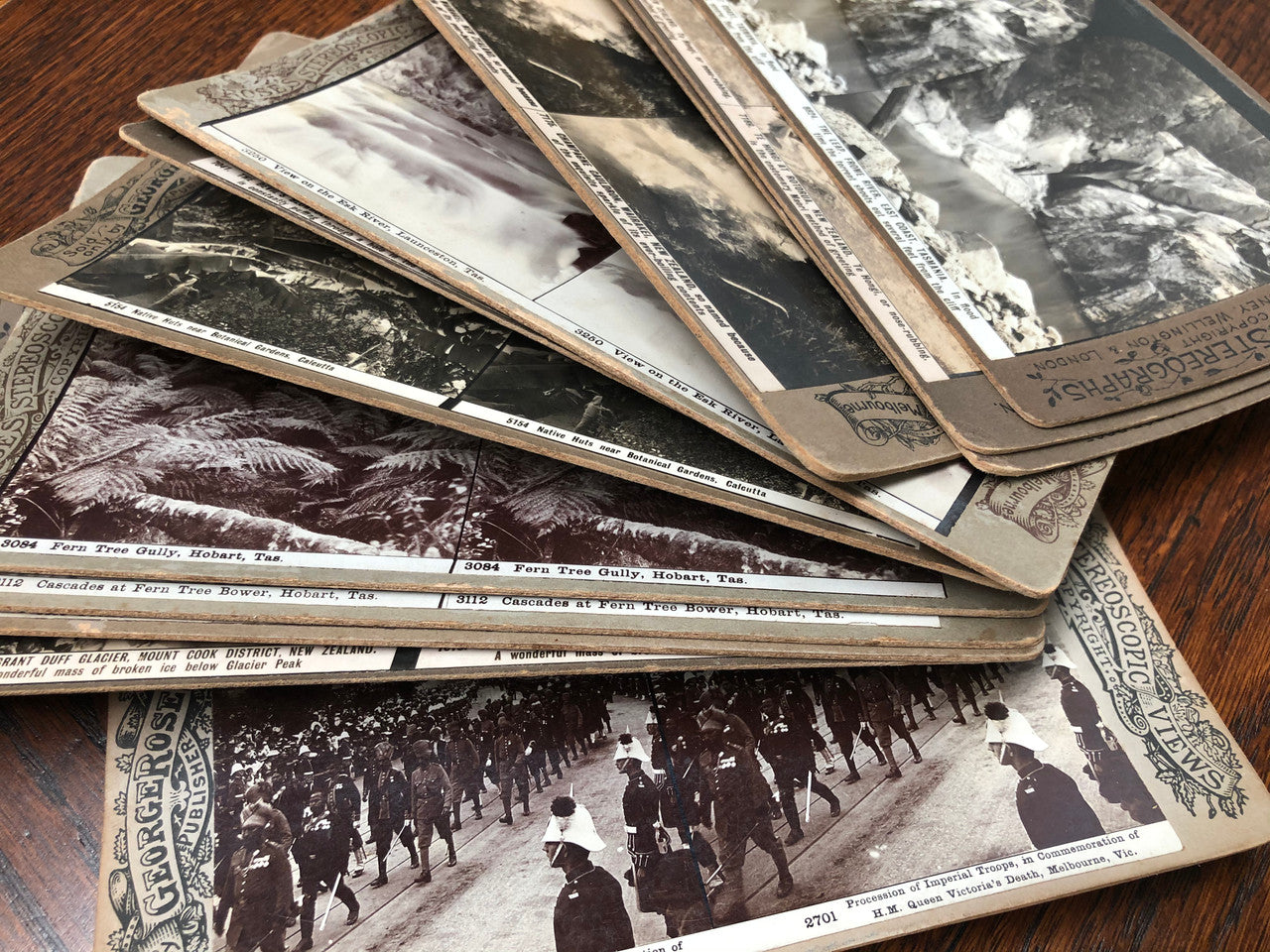 Victorian beautiful Walnut stereoscope viewer with 12 amazing photo view cards of all different locations. In good original detailed condition.