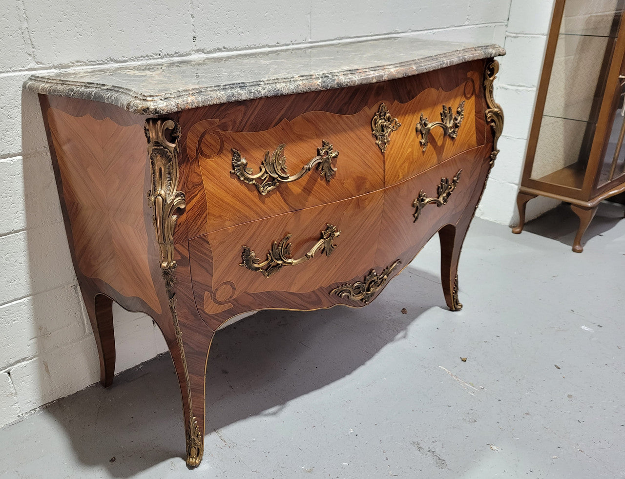 Stunning French Walnut and Rosewood Louis XV style two drawer commode with a beautiful marble top and ormolu mounts. In good original detailed condition.