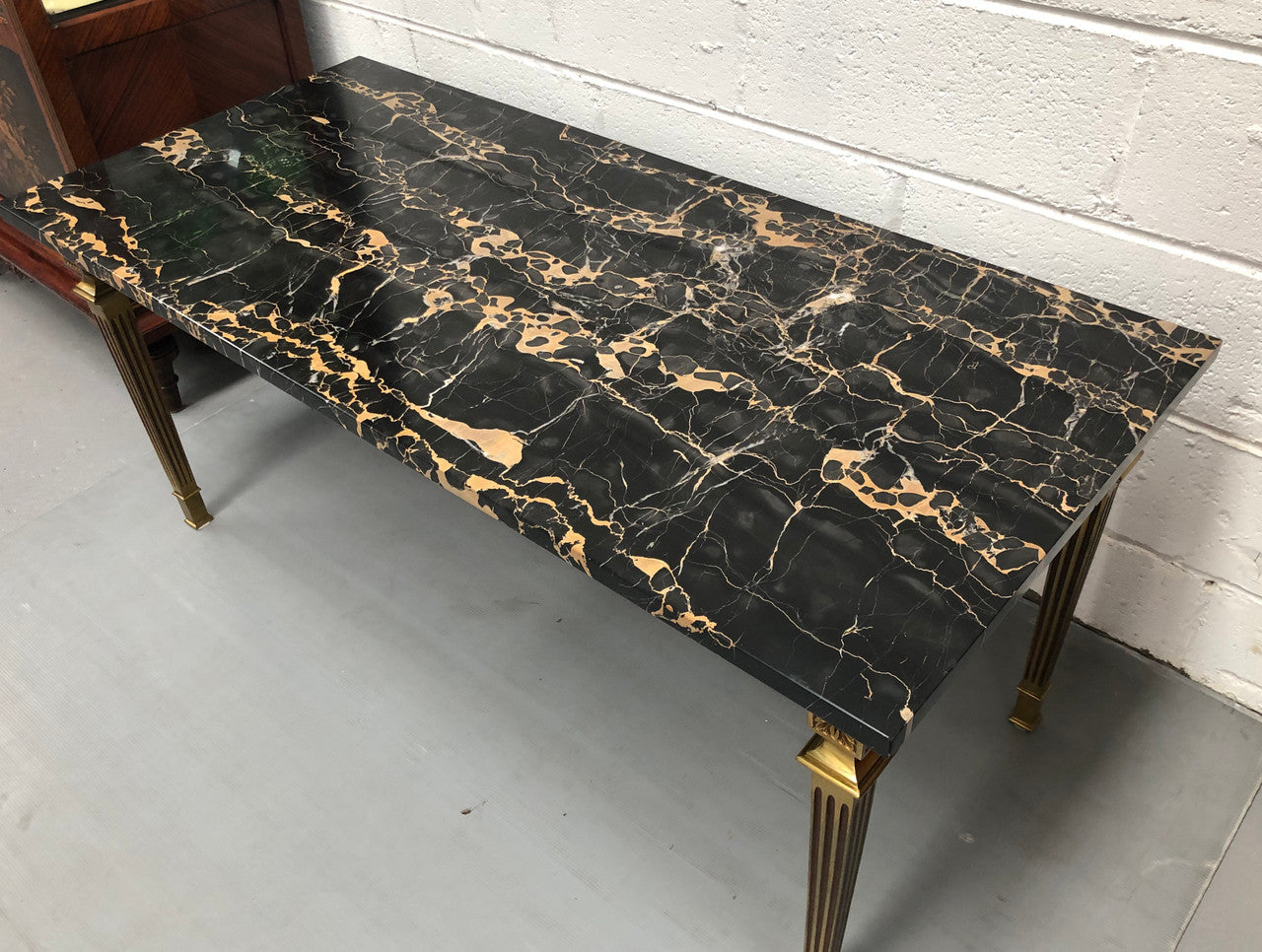 French Art Deco Coffee Table With A Portoro Marble Top
