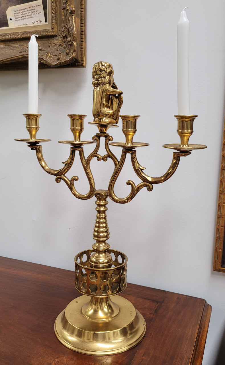 Pair of large Antique French Brass candelabras with lions. They have been sourced from France and are in good original detailed condition.