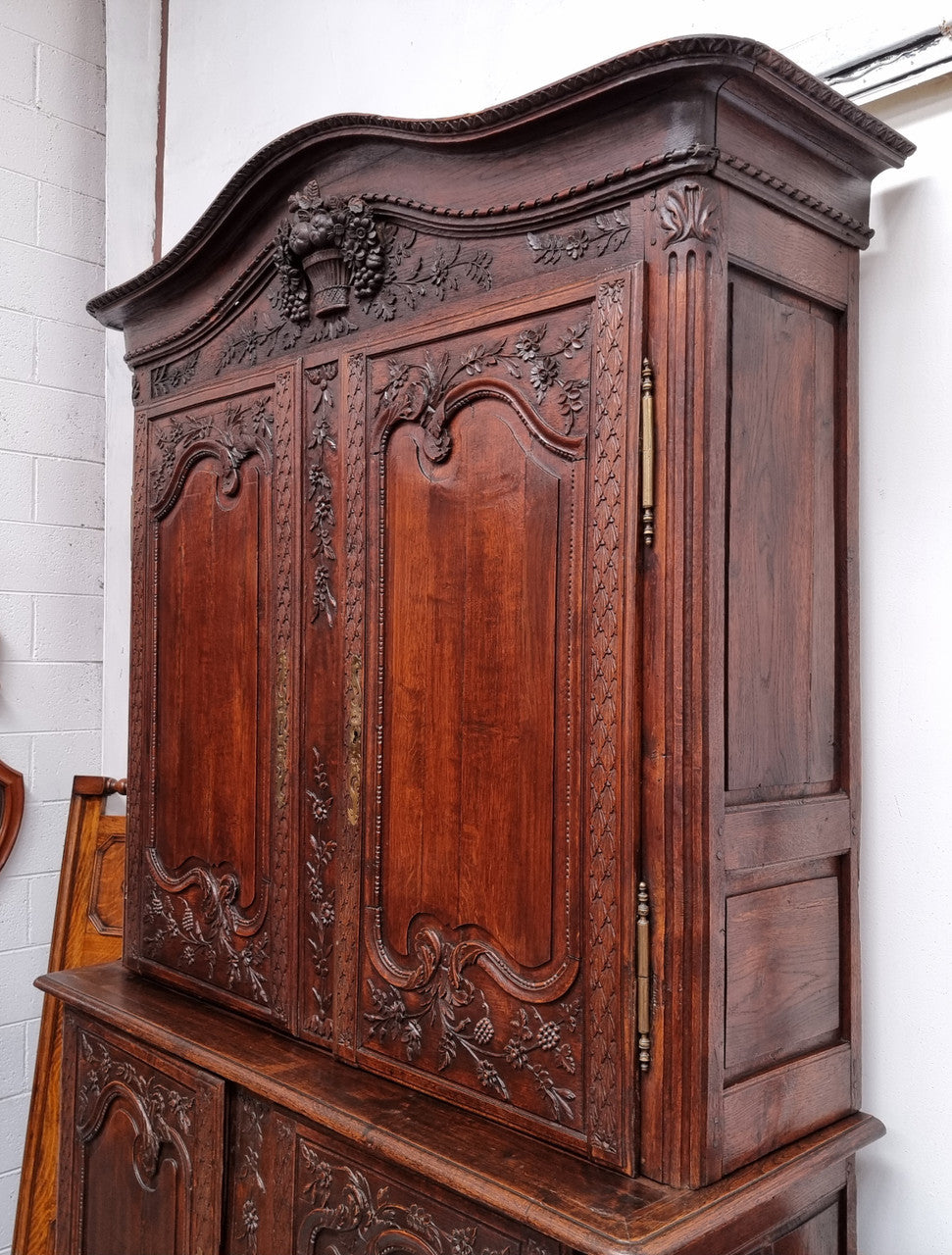 French Oak 18th Century superbly carved sideboard buffet. This amazing buffet has loads of character which is expected being circa 1790's. The top section has two fixed shelves and the bottom section has one fixed shelf. It has been sourced from France and is in good original detailed condition.