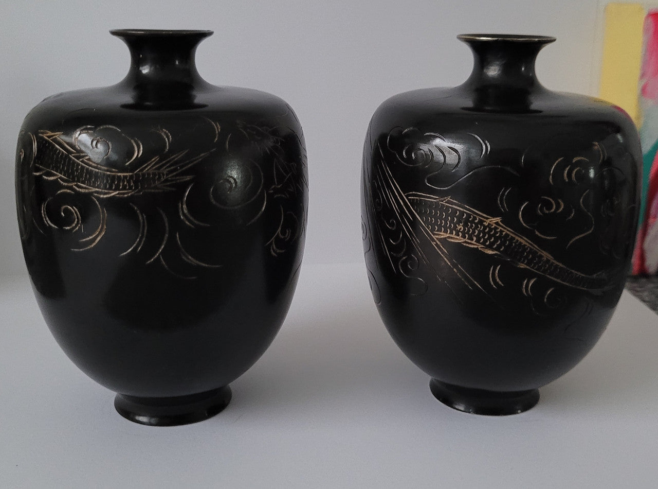 Pair of Antique Meiji Period Japanese etched Bronze vases. It is in good original condition, please view photos as they help form part of the description.