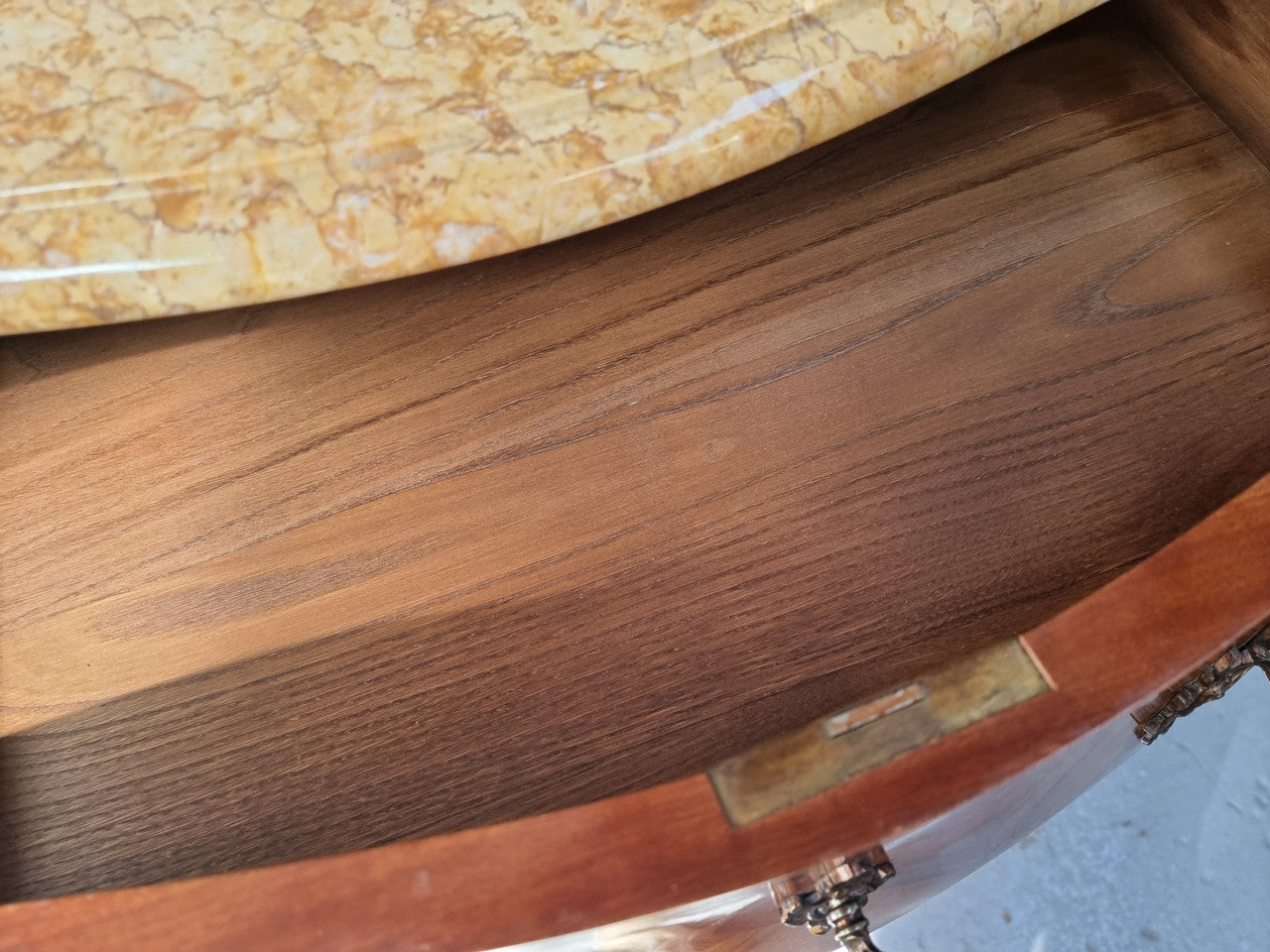 French marquetry inlaid Kingwood marble top commode. It has two drawers and beautiful mounts. Is in good original detailed condition.